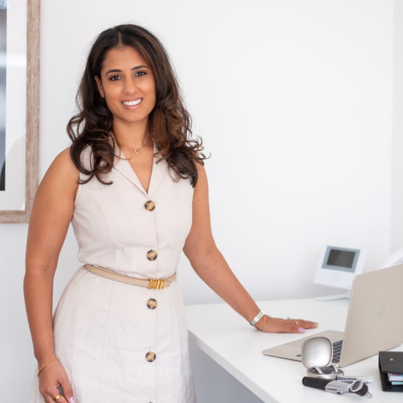 Dr Yovina stood by her computer