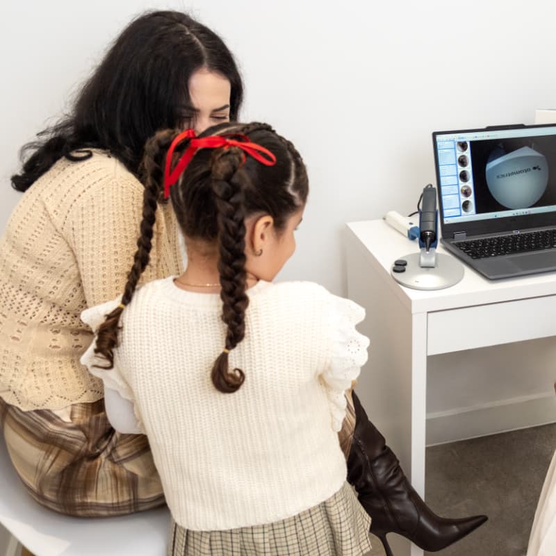 Dr Yovina completing a children’s glue ear consultation