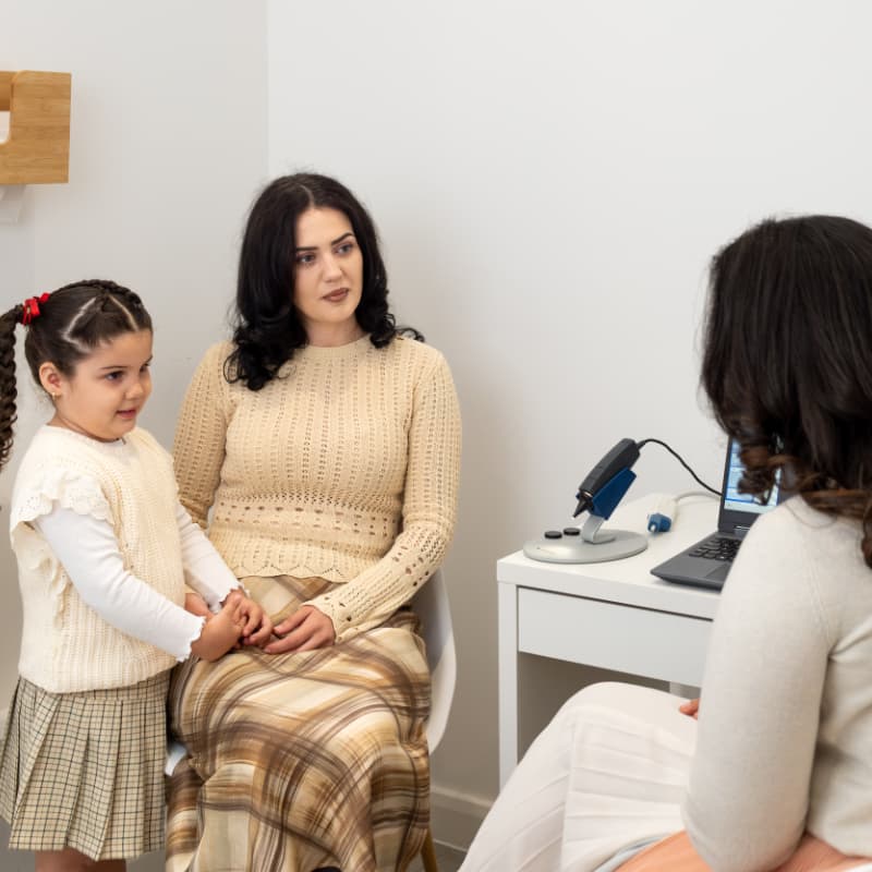 Dr Yovina completing a children’s glue ear consultation