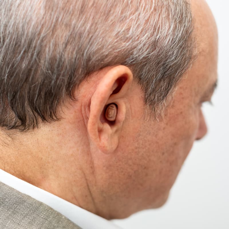 Man wearing Completely-in-Canal CIC hearing aids